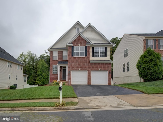 7436 Pensacola Pl, Gainesville, VA 20155 - view of front of house featuring brick siding, asphalt driveway, a garage, and a front lawn