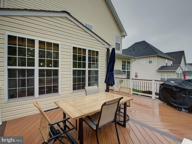 7436 Pensacola Pl, Gainesville, VA 20155 - wooden deck with grilling area and outdoor dining area