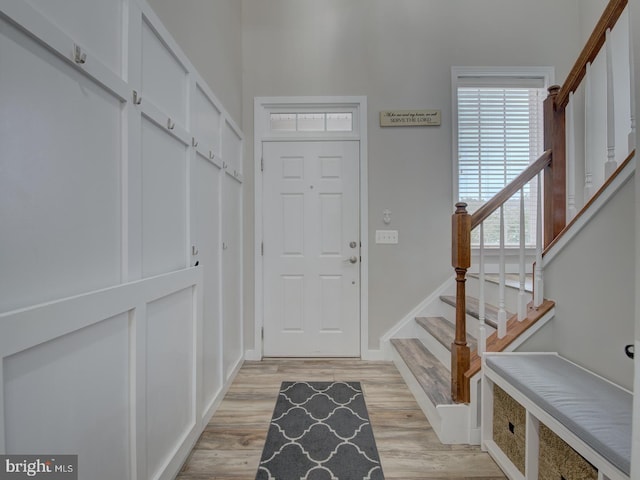 7436 Pensacola Pl, Gainesville, VA 20155 - foyer featuring light wood-style floors and stairs