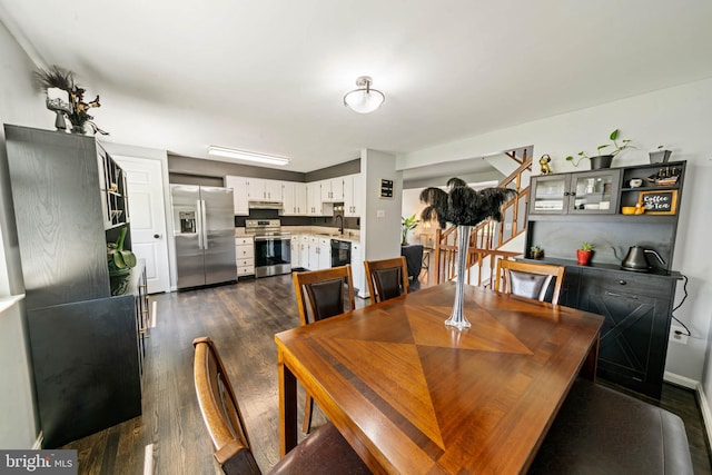 9946 Canvasback Way, Damascus, MD 20872 - dining space with dark wood-style flooring and stairs