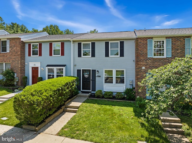 9946 Canvasback Way, Damascus, MD 20872 - townhome / multi-family property featuring a front yard and brick siding