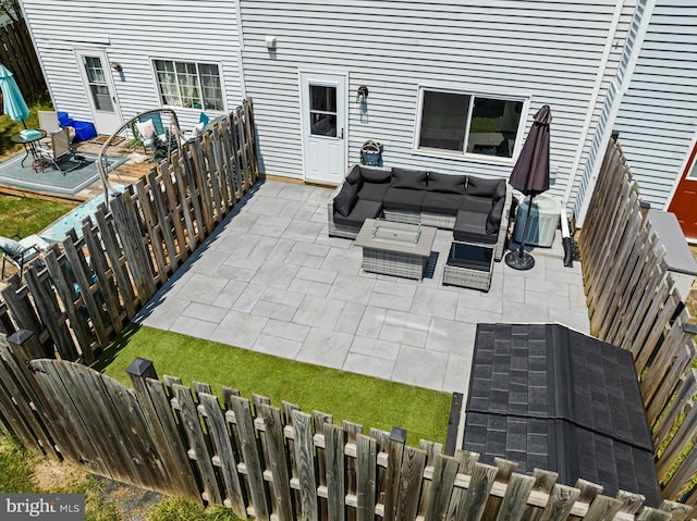 9946 Canvasback Way, Damascus, MD 20872 - fenced backyard featuring a patio and an outdoor living space