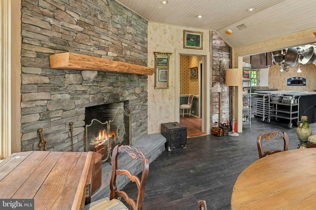 282 Crabapple Ln, East Stroudsburg, PA 18302 - dining area with lofted ceiling, wood ceiling, wood finished floors, recessed lighting, and a stone fireplace
