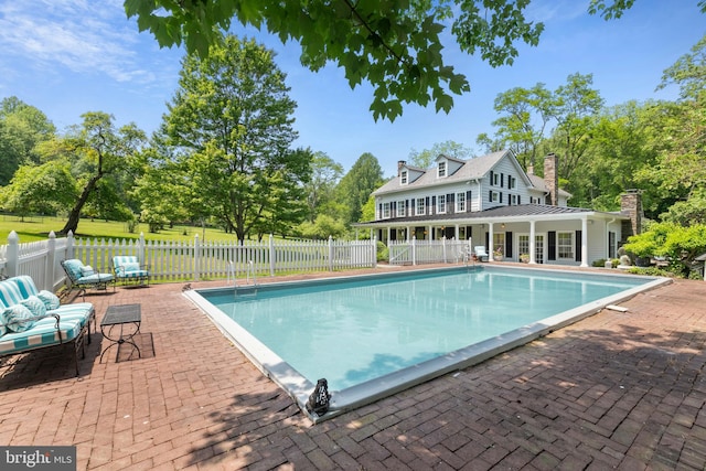 282 Crabapple Ln, East Stroudsburg, PA 18302 - view of swimming pool featuring a patio and view of wooded area
