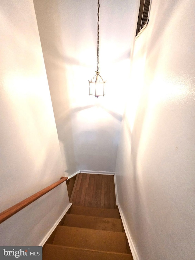 6529 Huntshire Dr, Elkridge, MD 21075 - staircase featuring wood finished floors