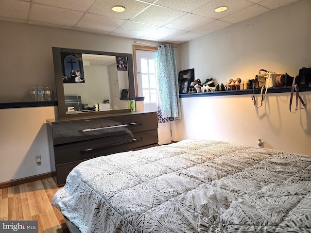 6529 Huntshire Dr, Elkridge, MD 21075 - bedroom with wood finished floors and a drop ceiling