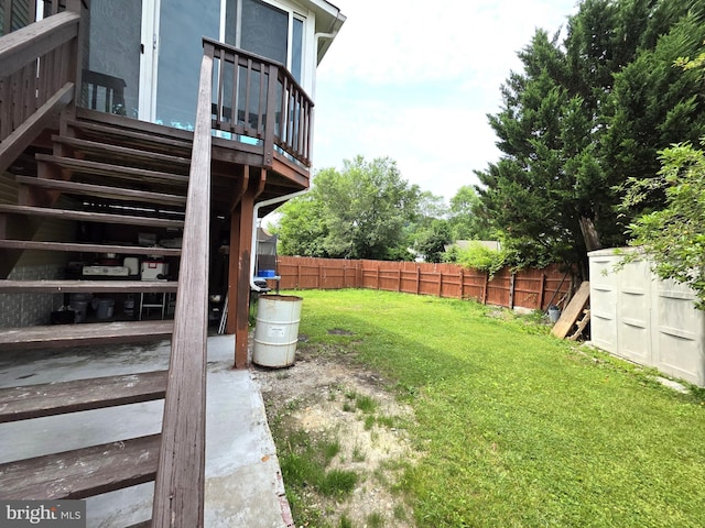 6529 Huntshire Dr, Elkridge, MD 21075 - fenced backyard with stairs and a wooden deck