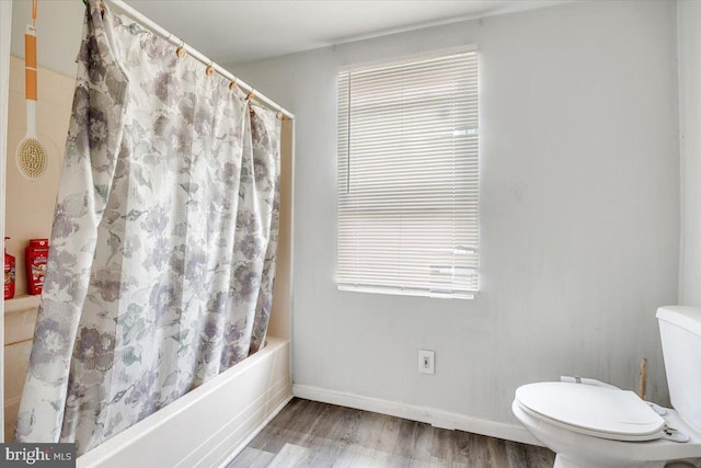 301 Broad St, Beverly, NJ 08010 - bathroom with wood finished floors, shower / bath combo, and healthy amount of natural light