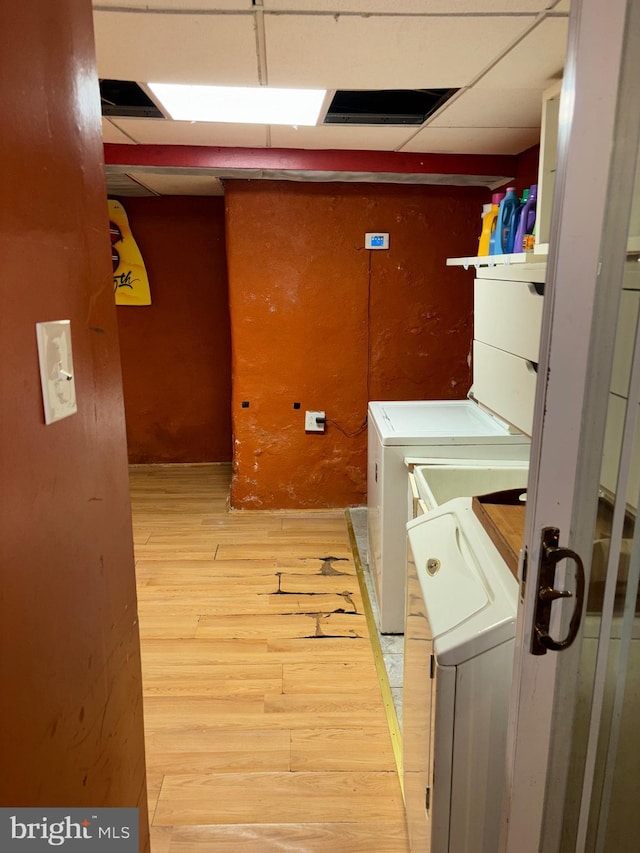 5122 Stenton Ave, Philadelphia, PA 19144 - laundry area featuring washer and clothes dryer and light wood-style flooring