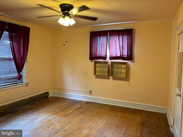 5122 Stenton Ave, Philadelphia, PA 19144 - unfurnished room with hardwood / wood-style flooring, a ceiling fan, healthy amount of natural light, and a baseboard heating unit