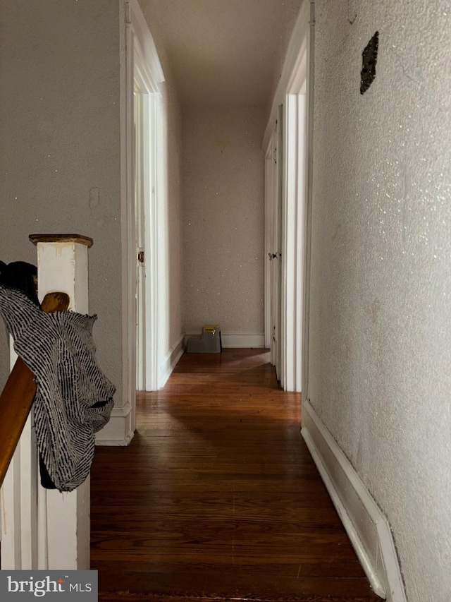 5122 Stenton Ave, Philadelphia, PA 19144 - hallway featuring wood-type flooring and a textured wall