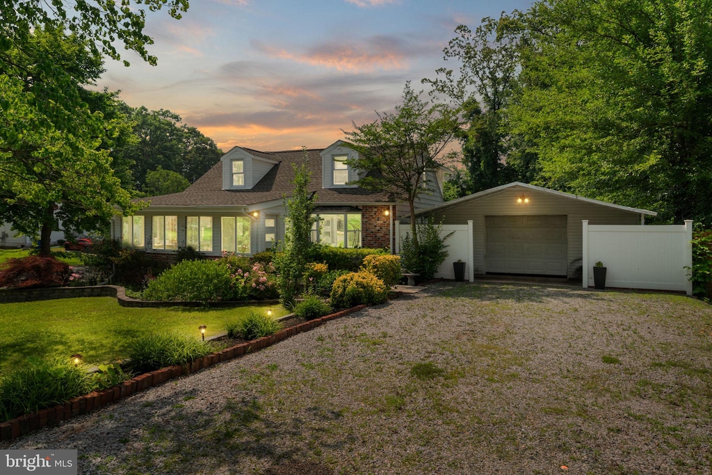 20 Aquia Ave, Stafford, VA 22556 - view of front facade featuring driveway, brick siding, and a detached garage