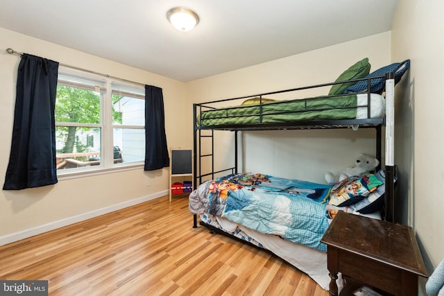 104 N Beech Ave, Highland Springs, VA 23075 - bedroom featuring wood finished floors and baseboards
