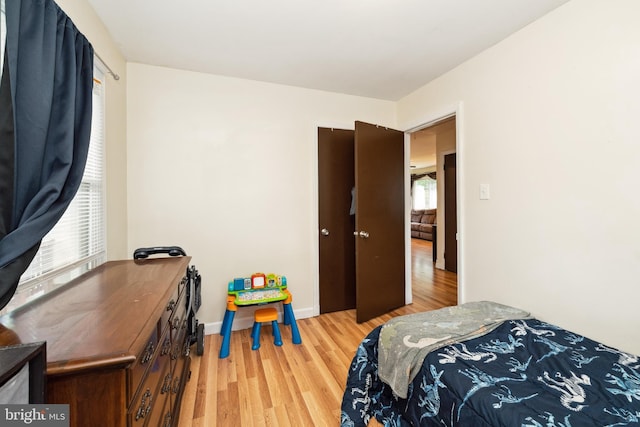 104 N Beech Ave, Highland Springs, VA 23075 - bedroom with wood finished floors and baseboards