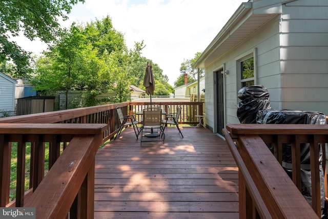 104 N Beech Ave, Highland Springs, VA 23075 - wooden deck featuring outdoor dining space and a shed