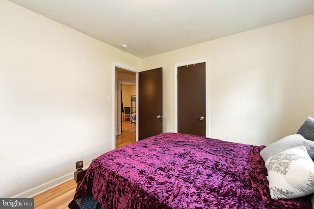 104 N Beech Ave, Highland Springs, VA 23075 - bedroom with light wood-style floors and baseboards