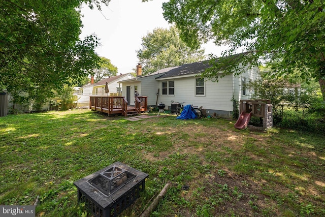 104 N Beech Ave, Highland Springs, VA 23075 - view of yard featuring a deck and a fire pit