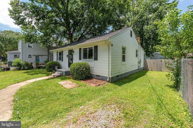 104 N Beech Ave, Highland Springs, VA 23075 - view of front facade featuring crawl space and a fenced backyard