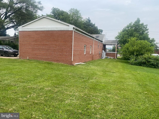 14604 Bowie Rd, Laurel, MD 20708 - view of property exterior with a lawn and brick siding