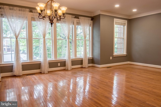 114 Herndon Mill Cir, Herndon, VA 20170 - unfurnished room with hardwood / wood-style floors, crown molding, and a chandelier