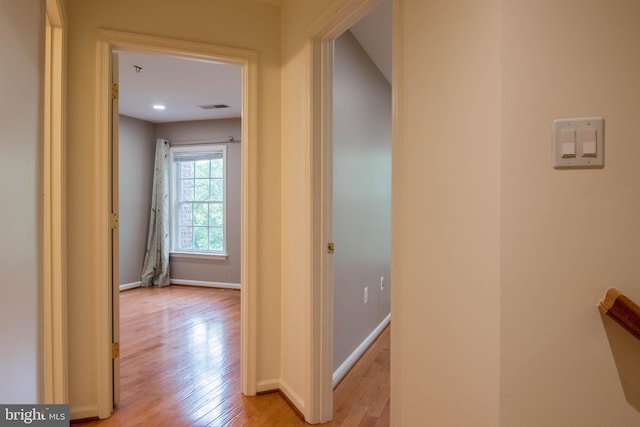 114 Herndon Mill Cir, Herndon, VA 20170 - hallway featuring light wood-style flooring and baseboards