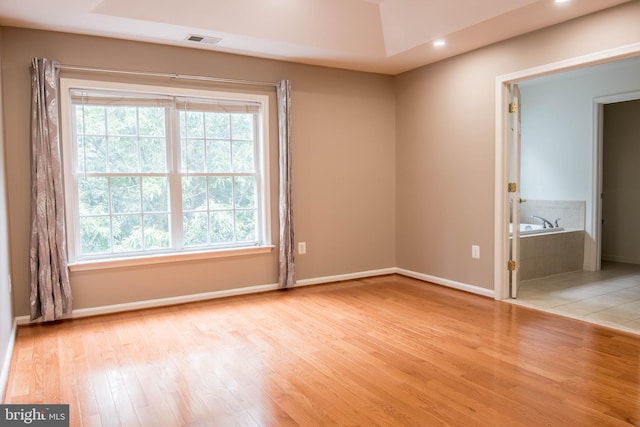 114 Herndon Mill Cir, Herndon, VA 20170 - spare room with healthy amount of natural light and wood finished floors