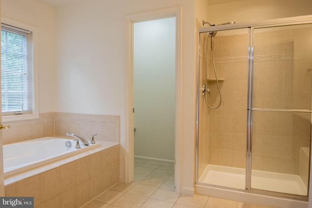 114 Herndon Mill Cir, Herndon, VA 20170 - full bath with a stall shower, a bath, and tile patterned floors