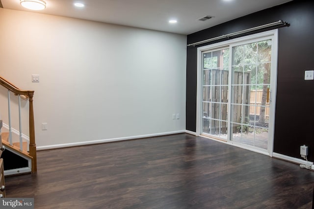 114 Herndon Mill Cir, Herndon, VA 20170 - empty room with stairway, wood finished floors, and recessed lighting