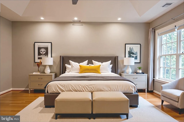 114 Herndon Mill Cir, Herndon, VA 20170 - bedroom featuring light wood finished floors, recessed lighting, and lofted ceiling