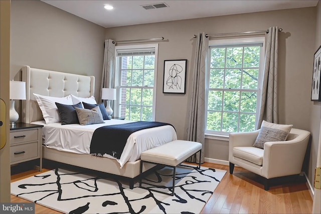 114 Herndon Mill Cir, Herndon, VA 20170 - bedroom featuring light wood-style flooring and recessed lighting