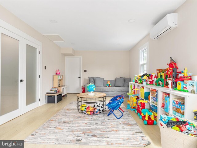 13222 Parson Ln, Fairfax, VA 22033 - rec room featuring an AC wall unit and wood finished floors