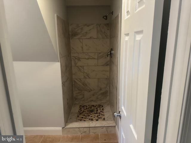 7107 Loch Raven Rd, Temple Hills, MD 20748 - bathroom with tiled shower and tile patterned floors