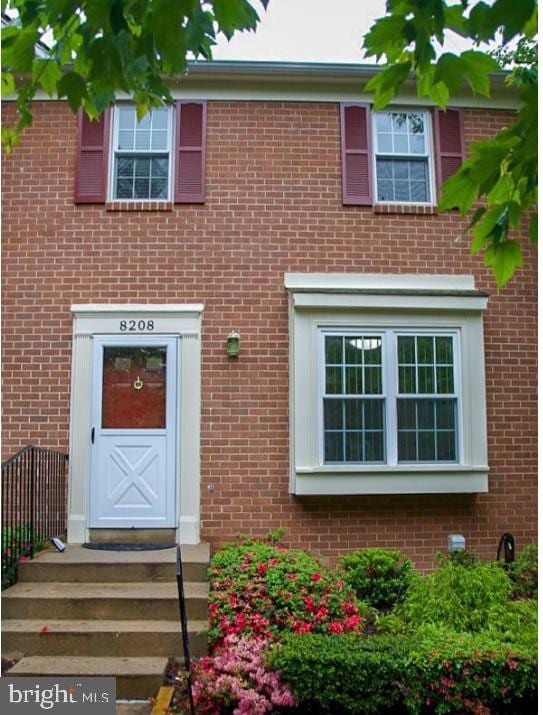 8208 Stationhouse Ct, Lorton, VA 22079 - entrance to property featuring brick siding