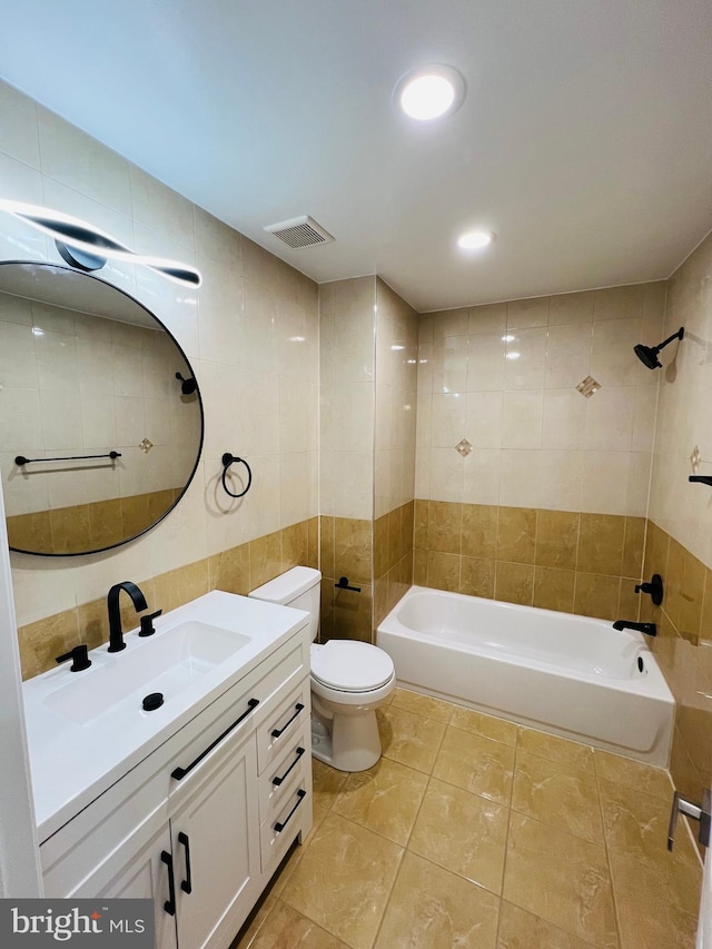 6610 N Smedley St, Philadelphia, PA 19126 - bathroom featuring tile walls, vanity, tile patterned flooring, shower / washtub combination, and recessed lighting