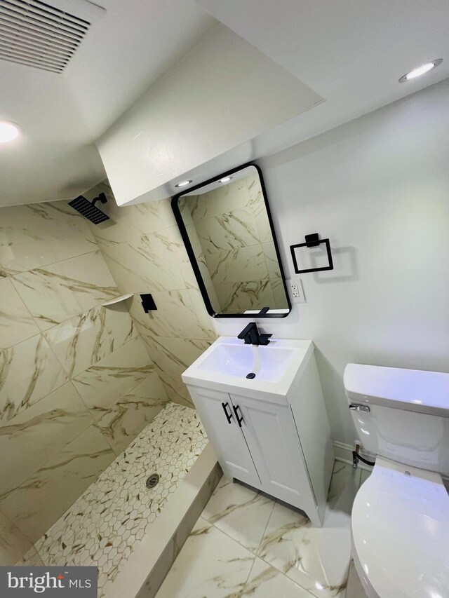 6610 N Smedley St, Philadelphia, PA 19126 - full bath with marble finish flooring, a marble finish shower, and vanity
