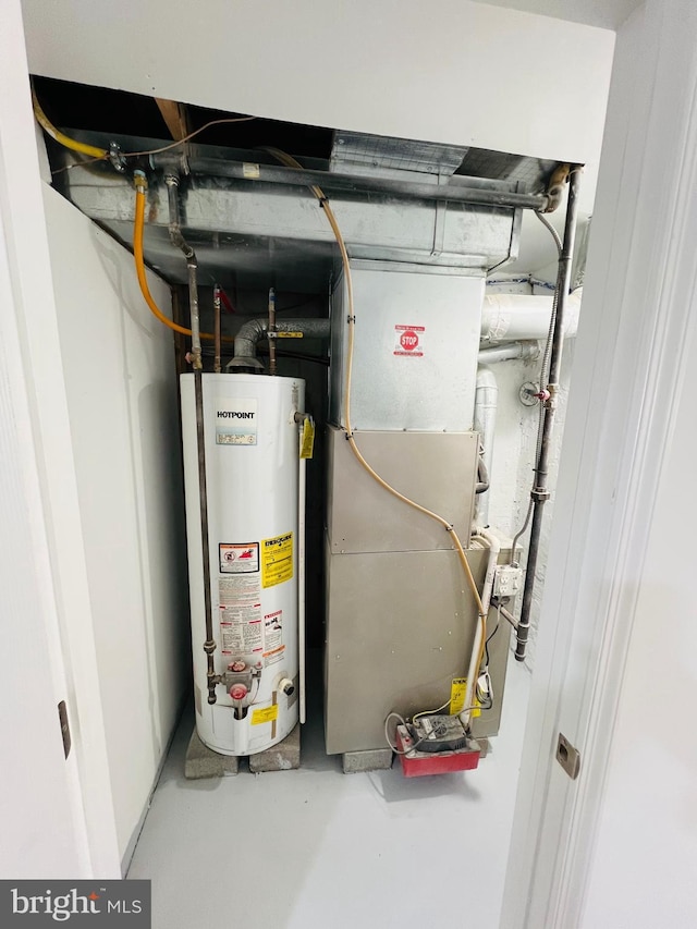 6610 N Smedley St, Philadelphia, PA 19126 - utility room with water heater and heating unit
