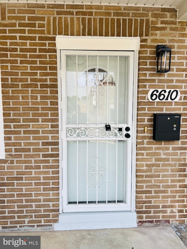 6610 N Smedley St, Philadelphia, PA 19126 - property entrance with brick siding