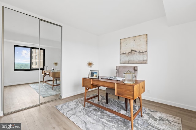 205 Yoakum Pkwy Unit 1712, Alexandria, VA 22304 - office area with wood finished floors and baseboards