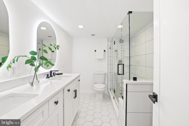 205 Yoakum Pkwy Unit 1712, Alexandria, VA 22304 - bathroom featuring double vanity, a stall shower, tile patterned floors, and recessed lighting