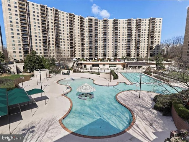 205 Yoakum Pkwy Unit 1712, Alexandria, VA 22304 - community pool featuring a patio