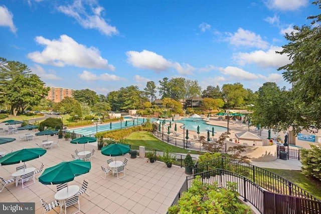 205 Yoakum Pkwy Unit 1712, Alexandria, VA 22304 - surrounding community with a pool and a patio area