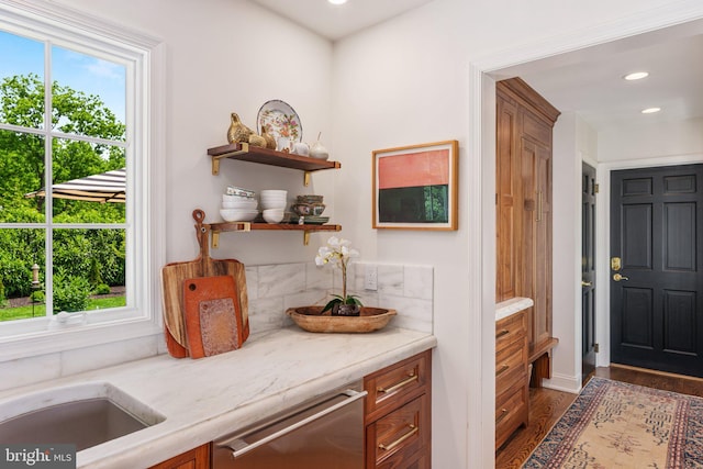 4704 Sweetbriar Cir, Emmaus, PA 18049 - bar featuring stainless steel dishwasher, dark wood-style floors, recessed lighting, and backsplash