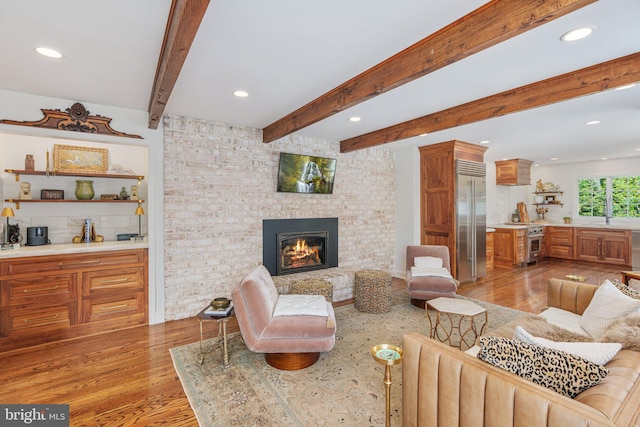 4704 Sweetbriar Cir, Emmaus, PA 18049 - living area with light wood finished floors, recessed lighting, a fireplace, and beamed ceiling