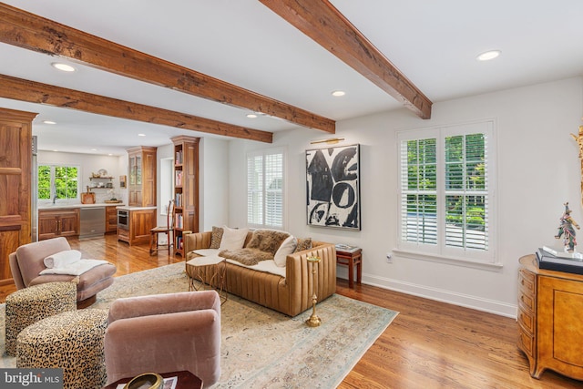 4704 Sweetbriar Cir, Emmaus, PA 18049 - living area with recessed lighting, light wood-style floors, beamed ceiling, and decorative columns