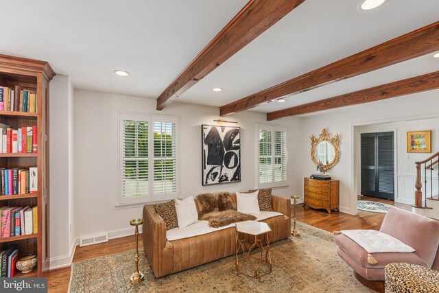 4704 Sweetbriar Cir, Emmaus, PA 18049 - living room with healthy amount of natural light, recessed lighting, wood finished floors, beamed ceiling, and stairway