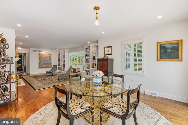 4704 Sweetbriar Cir, Emmaus, PA 18049 - dining room with light wood-style flooring, recessed lighting, and built in features