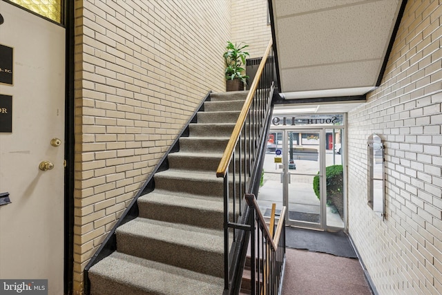 119 S Easton Rd, Glenside, PA 19038 - stairway with carpet floors and brick wall
