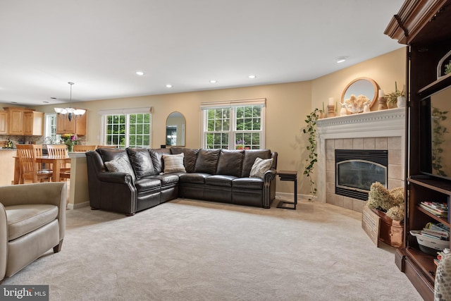 1817 Old Farm Ln, Lancaster, PA 17602 - living area with recessed lighting, a tiled fireplace, light carpet, and a chandelier