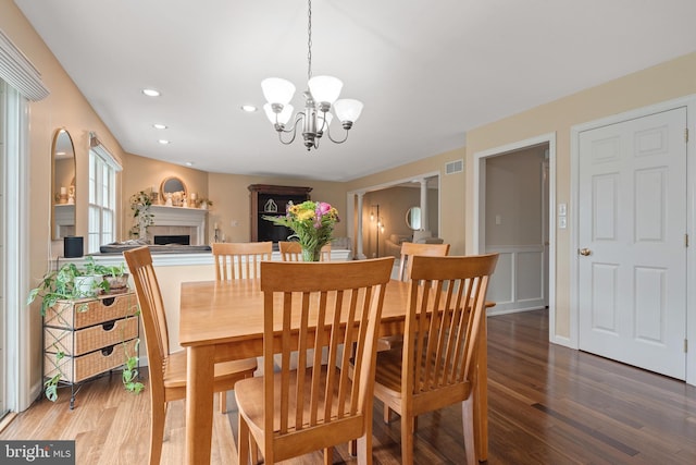 1817 Old Farm Ln, Lancaster, PA 17602 - dining space with a chandelier, wood finished floors, a fireplace, and recessed lighting