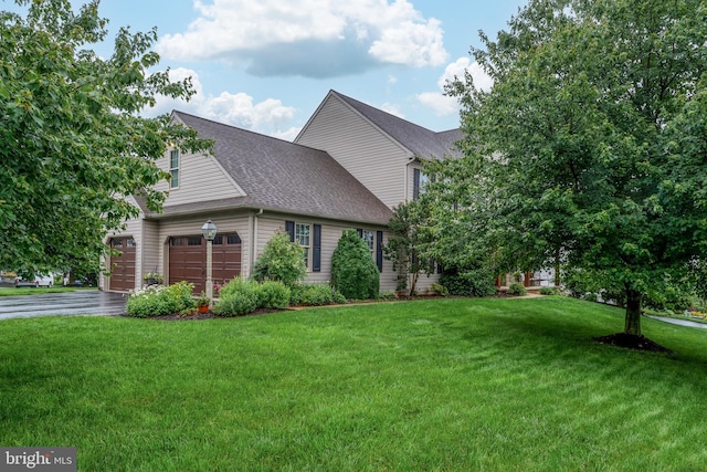 1817 Old Farm Ln, Lancaster, PA 17602 - view of front of house with an attached garage, a front yard, roof with shingles, and driveway